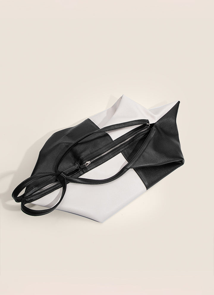 ISOLE公式｜ブラックバイカラーレザーバッグ、大容量で軽やか